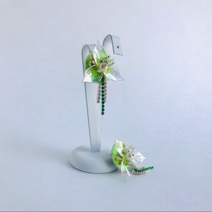 Floral stud earrings with crystal chain pendant